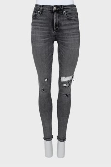 Skinny jeans with ripped effect