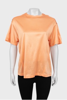 Orange T-shirt with raised seams