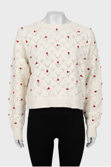 Cashmere sweater decorated with flowers