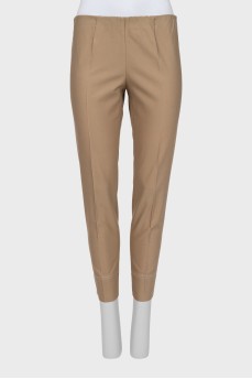 Tapered trousers with elastic