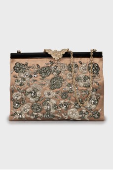 Textile clutch with beaded embroidery