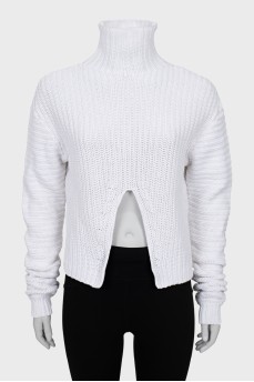 White sweater with a slit in the middle