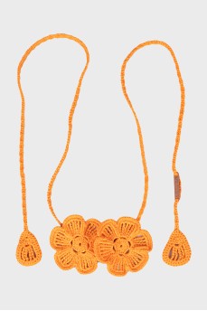 Orange knitted decoration