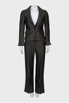 Suit with trousers in fine print