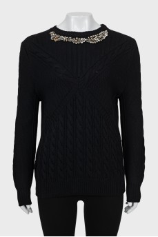 Wool jumper decorated with rhinestones