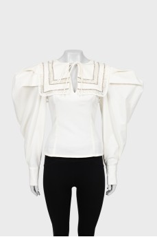 Blouse with voluminous sleeves with rhinestones