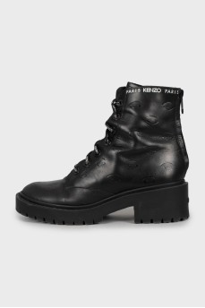 Black leather boots with embossing