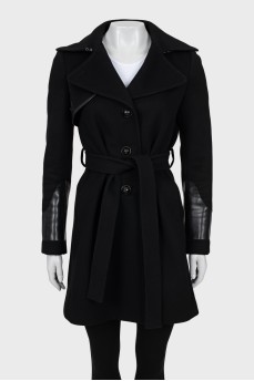 Fitted coat with leather inserts
