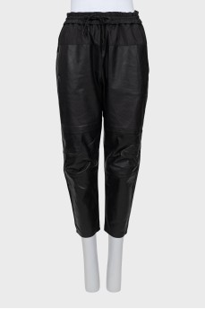 Leather trousers with textile upper