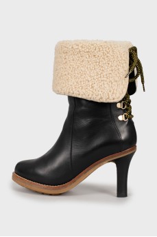 Insulated ankle boots with lace-up back