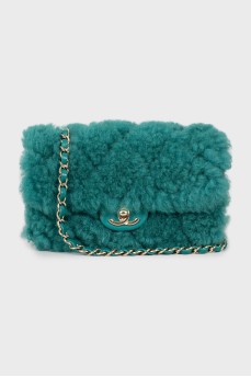 Crossbody bag decorated with fur