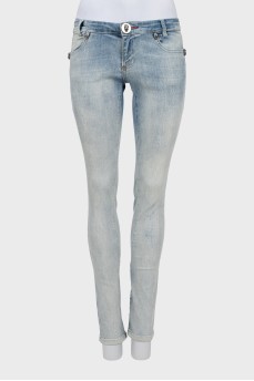 Low-rise jeans with skulls