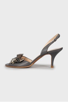 Gray leather sandals with decor