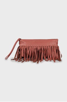Leather clutch decorated with fringe