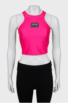 Pink sports top with tag