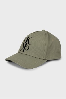 Green cap with company logo