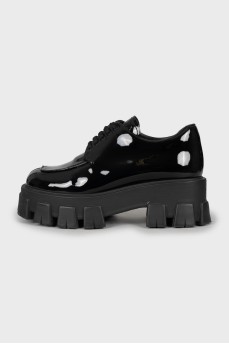 Black patent leather shoes with chunky soles