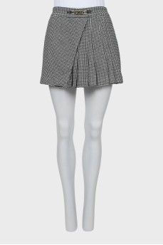 Short skirt in houndstooth print with tag