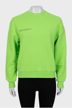 Green sweatshirt with text print