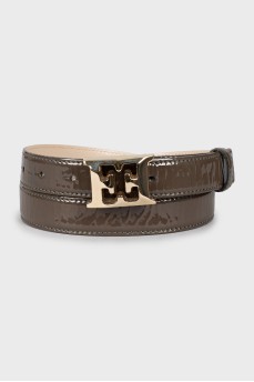 Patent leather belt with gold buckle