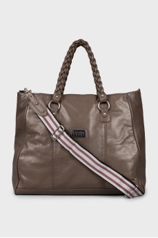 Leather travel bag with woven handles