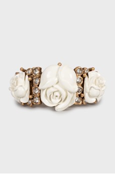 Metal bracelet decorated with flowers