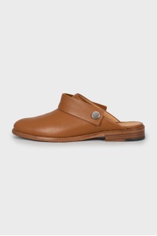 Brown leather clogs