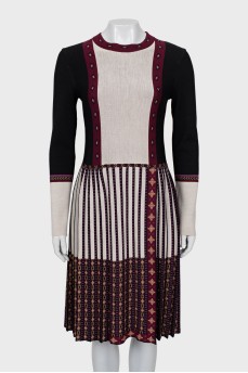 Wool dress with pleated hem