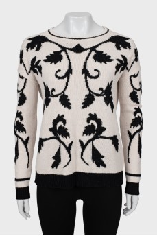 Black and white sweater with tag