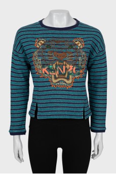 Sweatshirt decorated with embroidery and beads