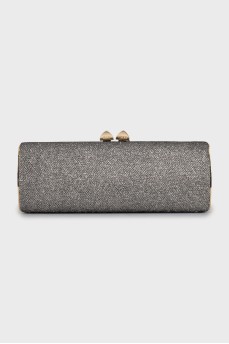 Shiny clutch with gold hardware