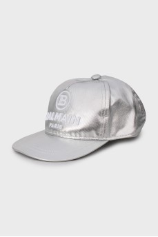 Silver cap with tag