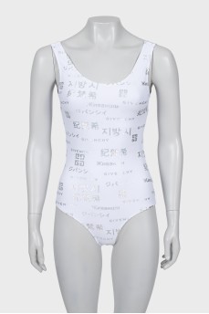One-piece swimsuit with text print and tag