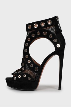 Shoes decorated with mesh and eyelet