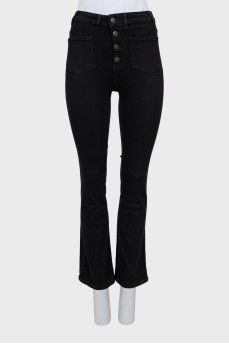 Black flared jeans with buttons