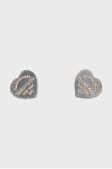 Silver earrings in the shape of hearts