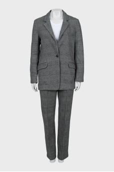 Suit with trousers in checkered print