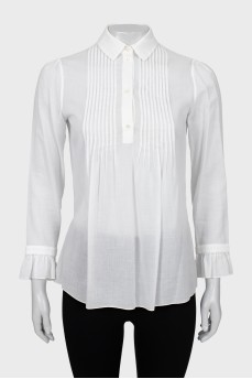 Sheer blouse with ruffled cuffs