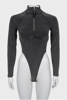 Bodysuit with raised seams and tag