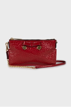 Red crossbody bag with bow