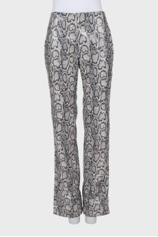 Eco-leather trousers in animal print
