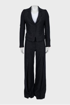 Suit with trousers with small polka dots