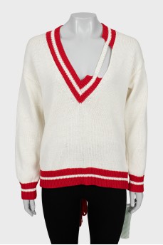 Knitted pullover with tag