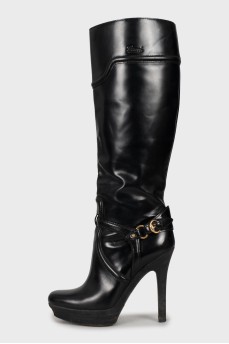 Black leather boots with heels