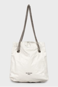 Leather shopping bag with metal strap
