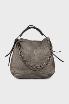 Hobo bag decorated with chain