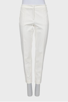 Tapered trousers with stitched creases