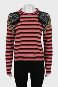 Striped sweater decorated with embroidery