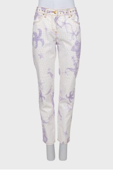 Printed jeans decorated with rhinestones