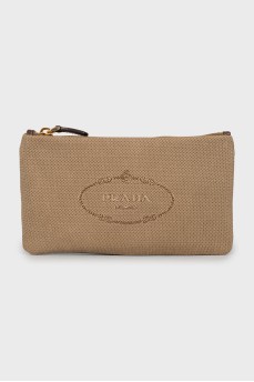 Textile clutch with brand logo